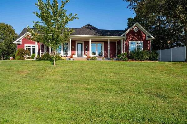 3.12 Acres of Land with Home for Sale in Philpot, Kentucky