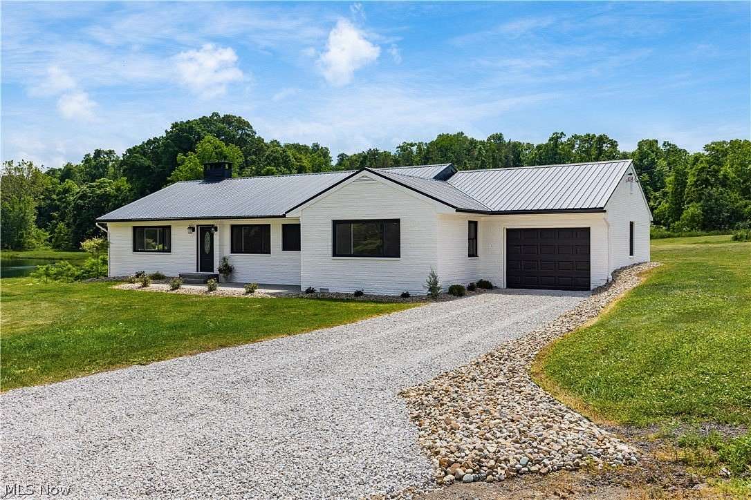 131 Acres of Land with Home for Auction in Lucas, Ohio