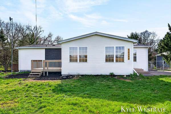 2.8 Acres of Land with Home for Sale in Sand Lake, Michigan