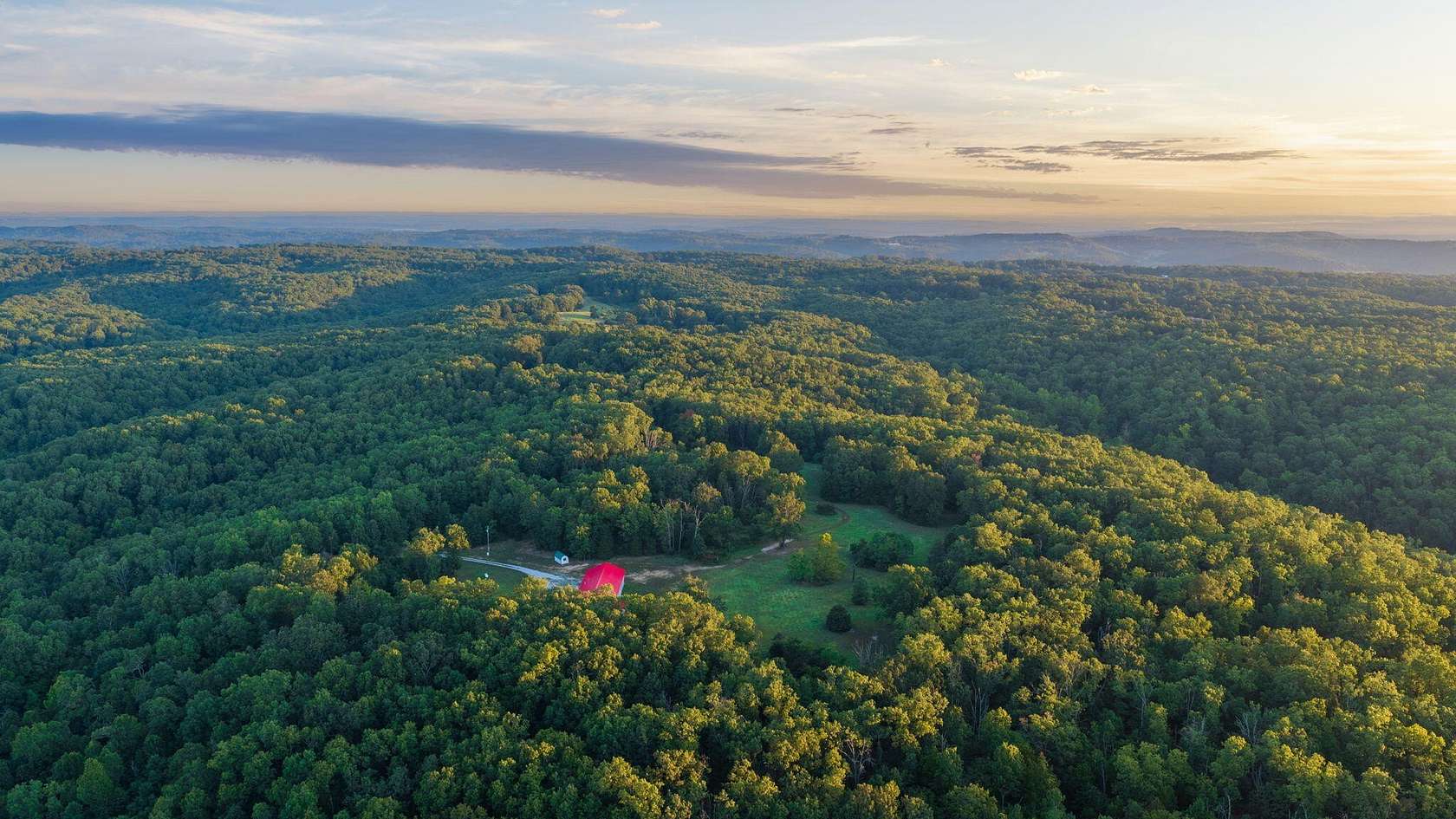 140 Acres of Recreational Land with Home for Sale in Squires, Missouri