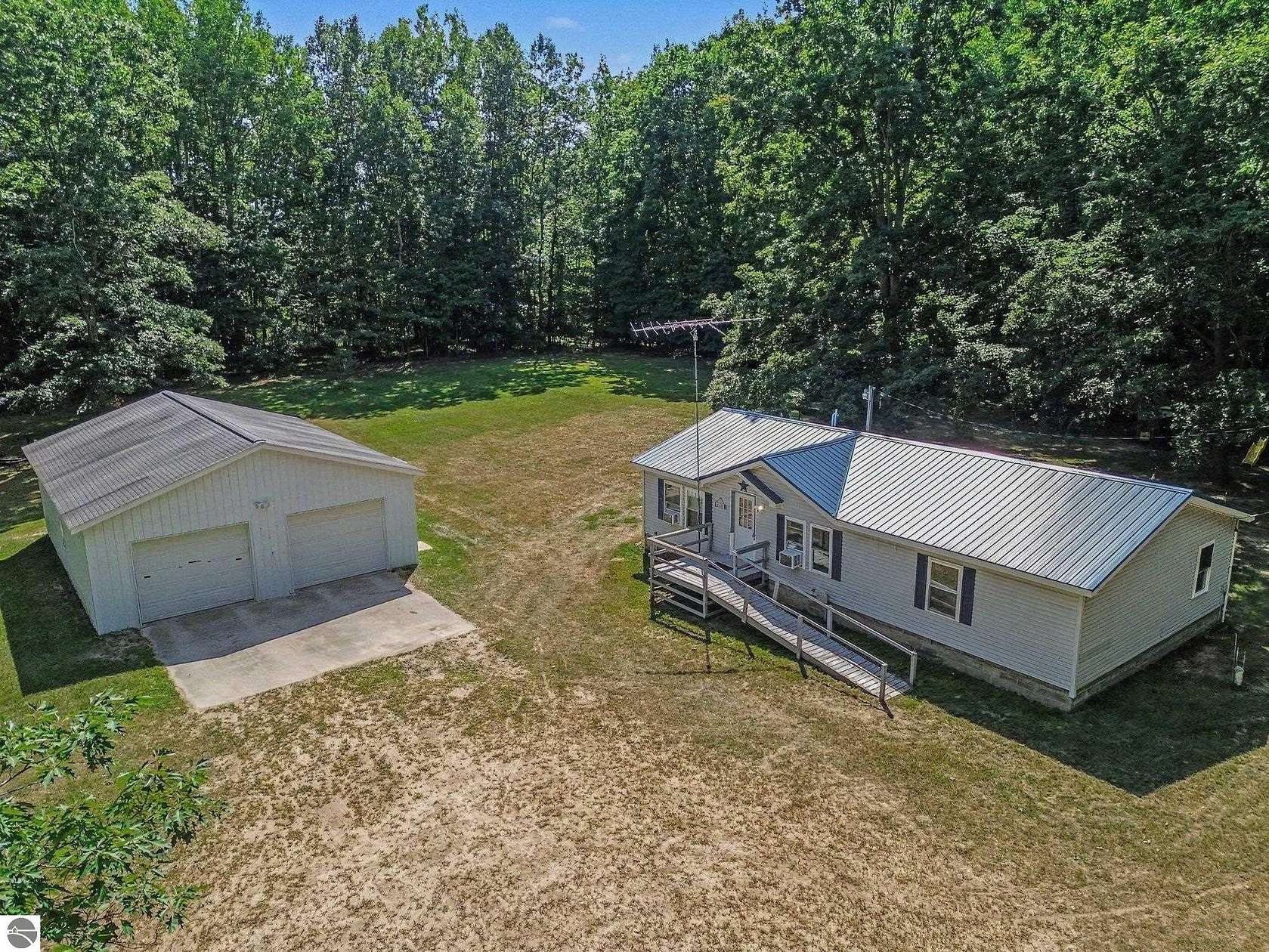 23.4 Acres of Recreational Land with Home for Sale in Riverdale, Michigan