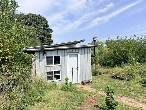 12.8 Acres of Land with Home for Sale in Bosworth, Missouri