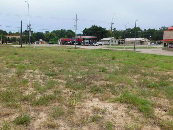 0.87 Acres of Commercial Land for Sale in Gilmer, Texas