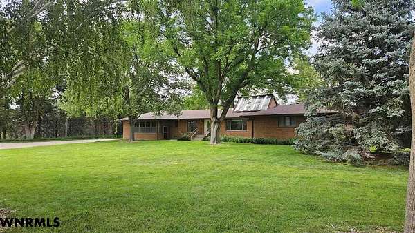 9.34 Acres of Land with Home for Sale in Scottsbluff, Nebraska