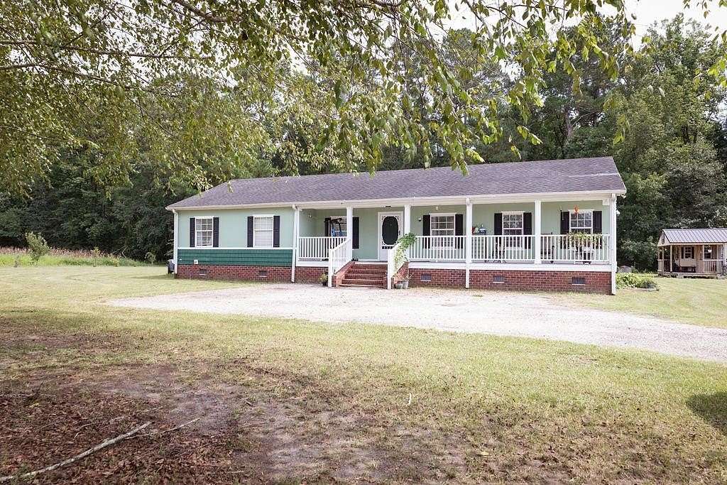 8.4 Acres of Land with Home for Sale in Nichols, South Carolina