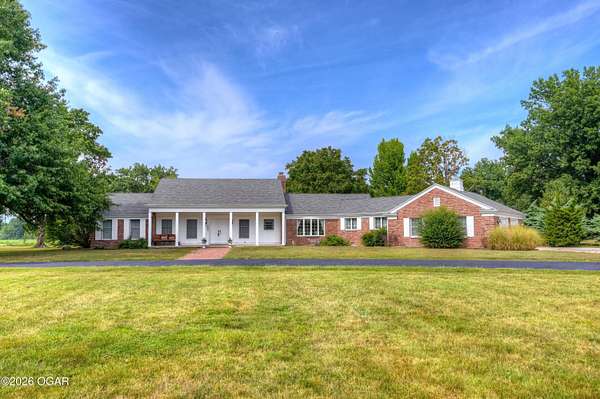 5.5 Acres of Land with Home for Sale in Lamar, Missouri