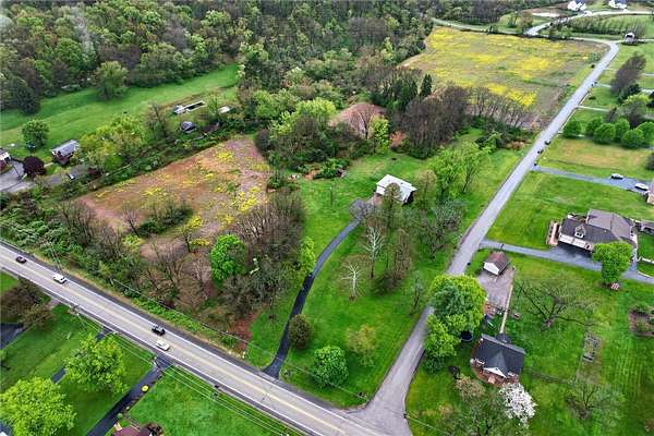 24.2 Acres of Land with Home for Sale in Sarver, Pennsylvania