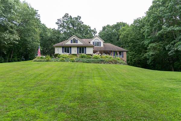 5 Acres of Land with Home for Sale in Howell, Michigan