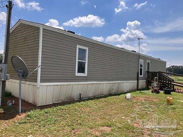 3.39 Acres of Land with Home for Sale in Jay, Florida