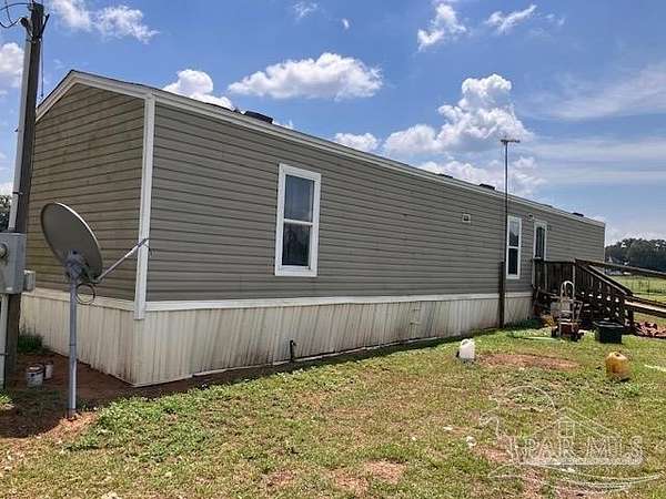 3.39 Acres of Land with Home for Sale in Jay, Florida