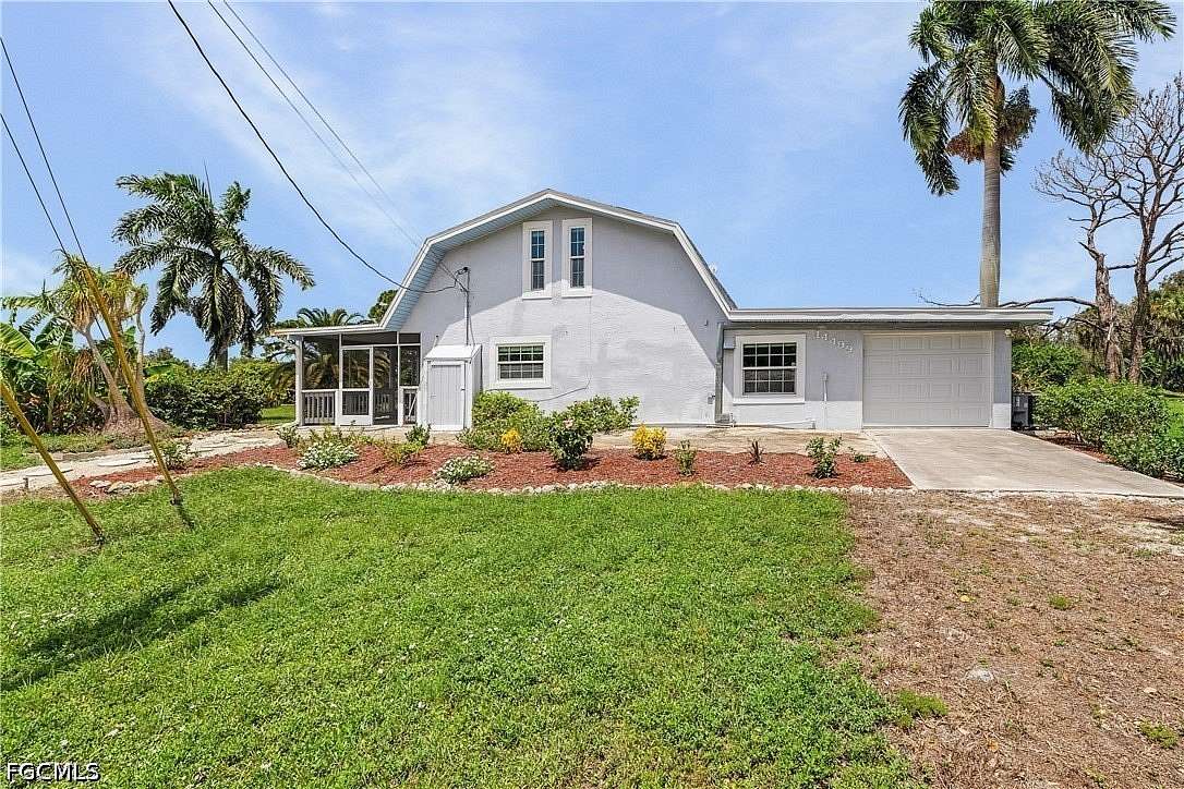 4.28 Acres of Land with Home for Sale in Bokeelia, Florida