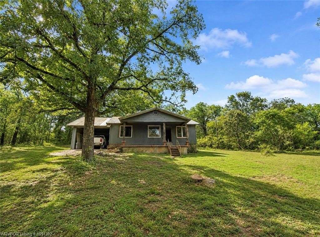 5 Acres of Land with Home for Sale in Muldrow, Oklahoma