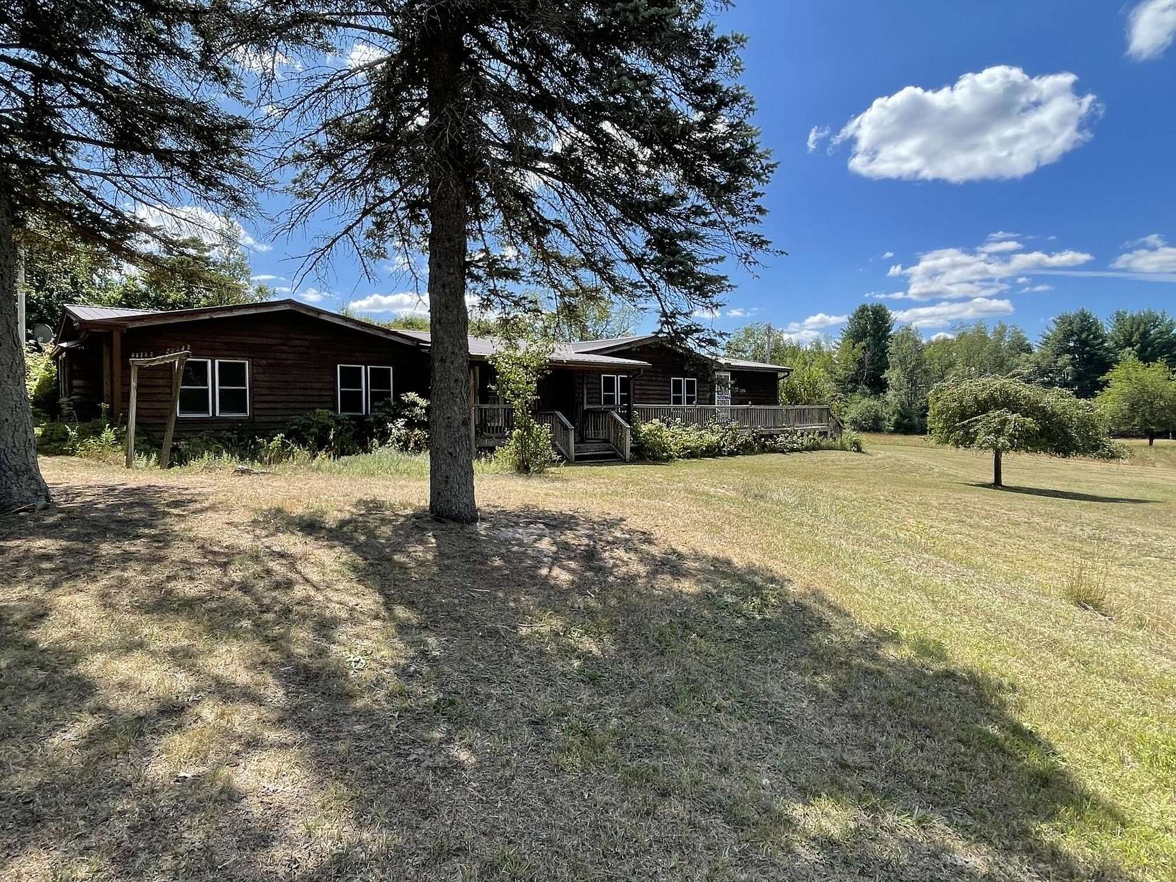 28.5 Acres of Recreational Land with Home for Sale in Luther, Michigan