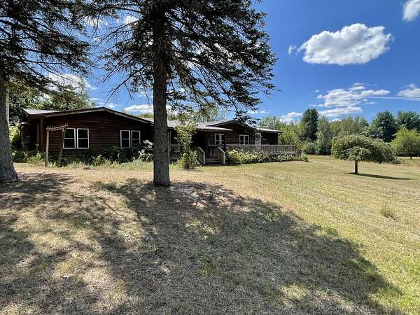 28.5 Acres of Recreational Land with Home for Sale in Luther, Michigan