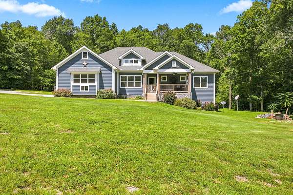 10.7 Acres of Land with Home for Sale in Columbia, Tennessee