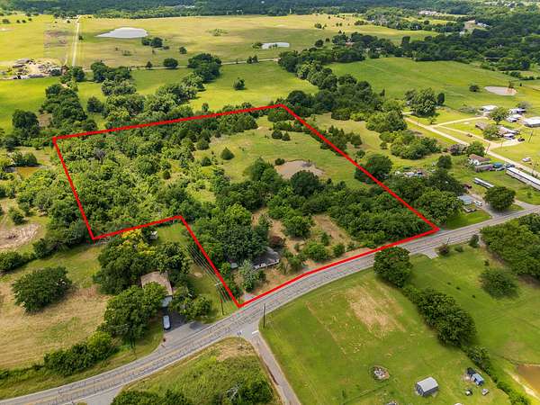 8.43 Acres of Land with Home for Sale in Ravenna, Texas