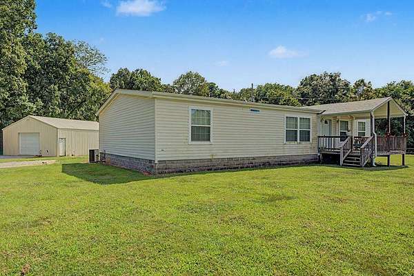 49 Acres of Land with Home for Sale in Crofton, Kentucky