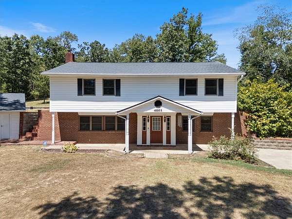10 Acres of Land with Home for Sale in Rogers, Arkansas