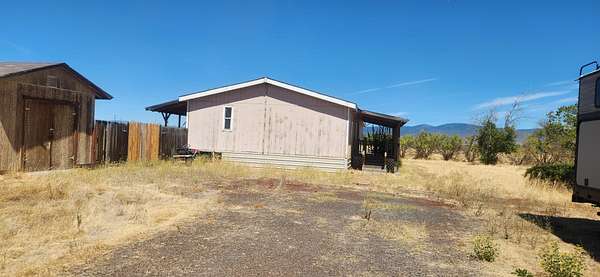 6 Acres of Land with Home for Sale in McArthur, California