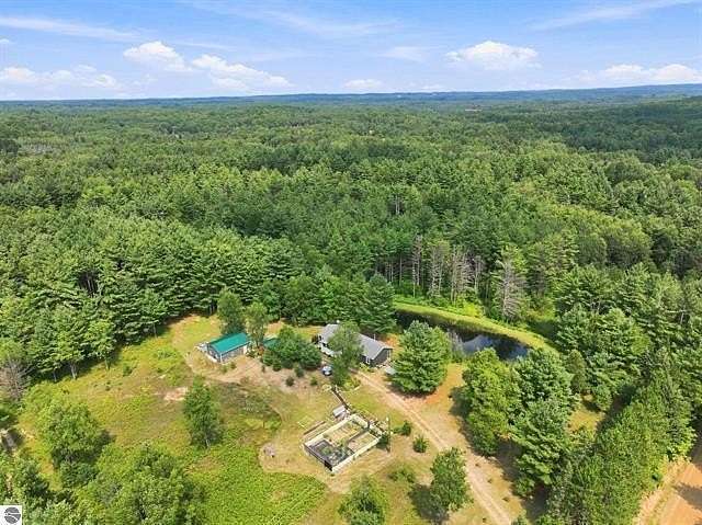 79 Acres of Recreational Land with Home for Sale in Tustin, Michigan