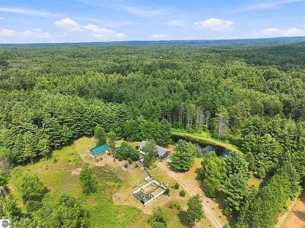79 Acres of Recreational Land with Home for Sale in Tustin, Michigan