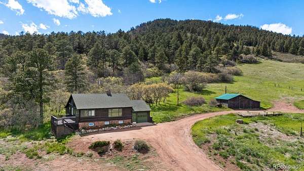 35 Acres of Land with Home for Sale in Palmer Lake, Colorado