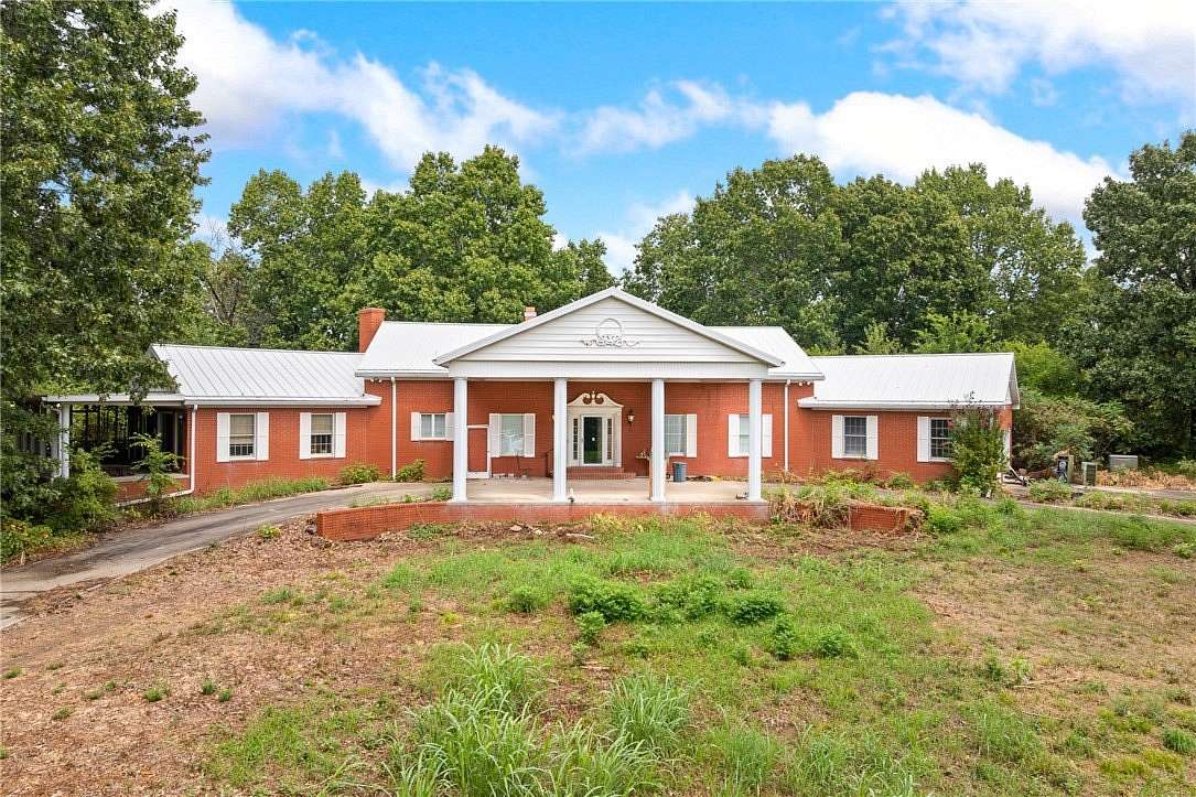 251 Acres of Land with Home for Sale in Western Grove, Arkansas