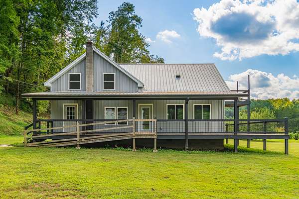 12.5 Acres of Land with Home for Sale in Pleasantville, Tennessee