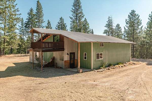 50 Acres of Land with Home for Sale in Loon Lake, Washington
