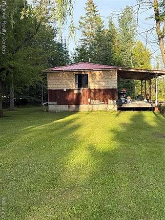 80 Acres of Recreational Land with Home for Sale in Belknap Township, Michigan