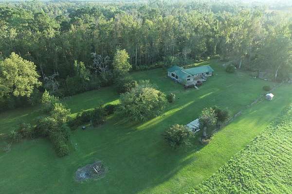 34 Acres of Agricultural Land with Home for Sale in Ray City, Georgia