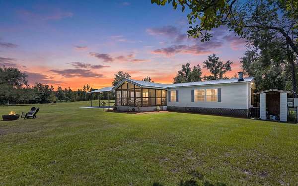 20.7 Acres of Land with Home for Sale in Live Oak, Florida