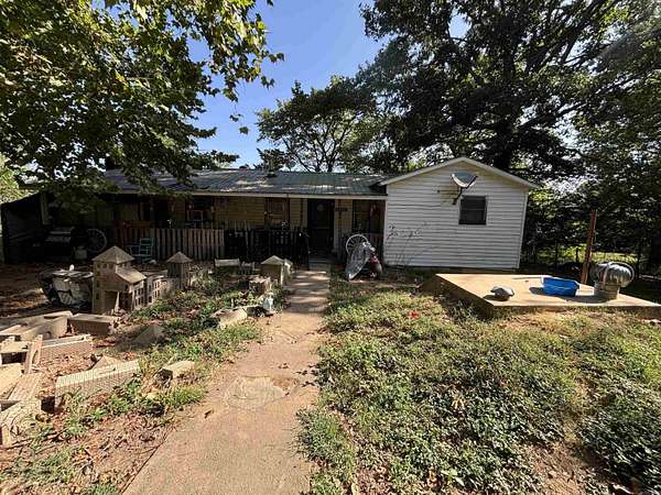 74.7 Acres of Land with Home for Sale in Smithville, Oklahoma
