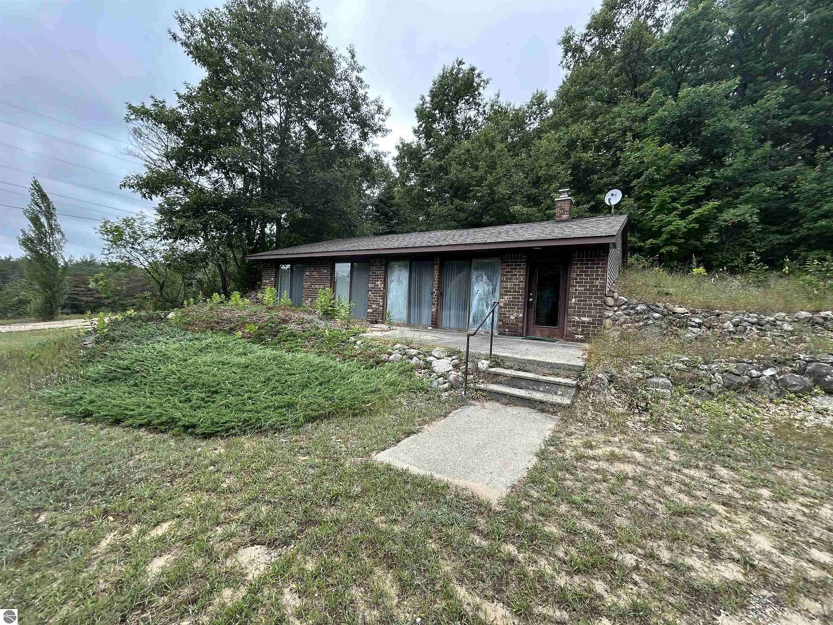 9.8 Acres of Land with Home for Sale in Mancelona, Michigan