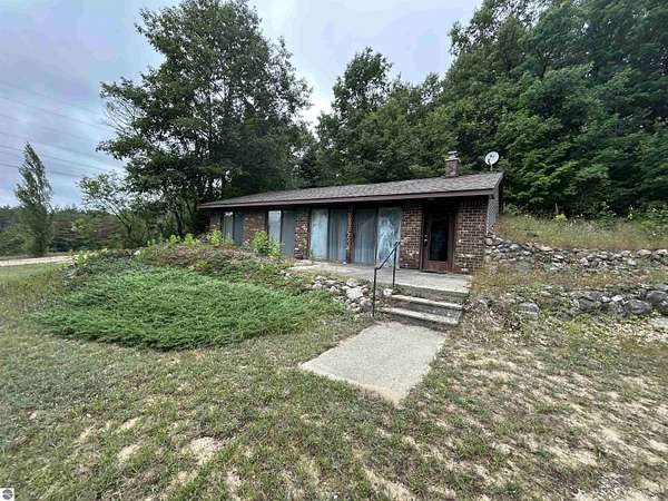 9.8 Acres of Land with Home for Sale in Mancelona, Michigan