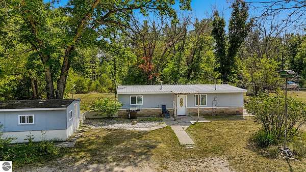 3.48 Acres of Land with Home for Sale in Baldwin, Michigan