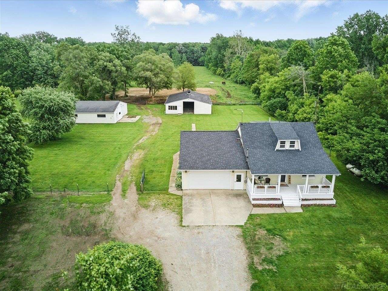 6.4 Acres of Land with Home for Sale in Birch Run, Michigan