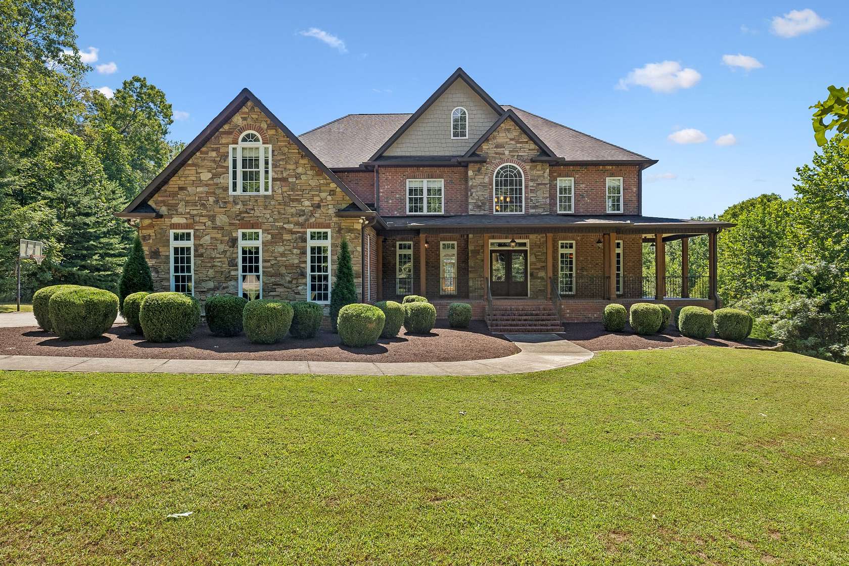 10 Acres of Land with Home for Auction in Burns, Tennessee