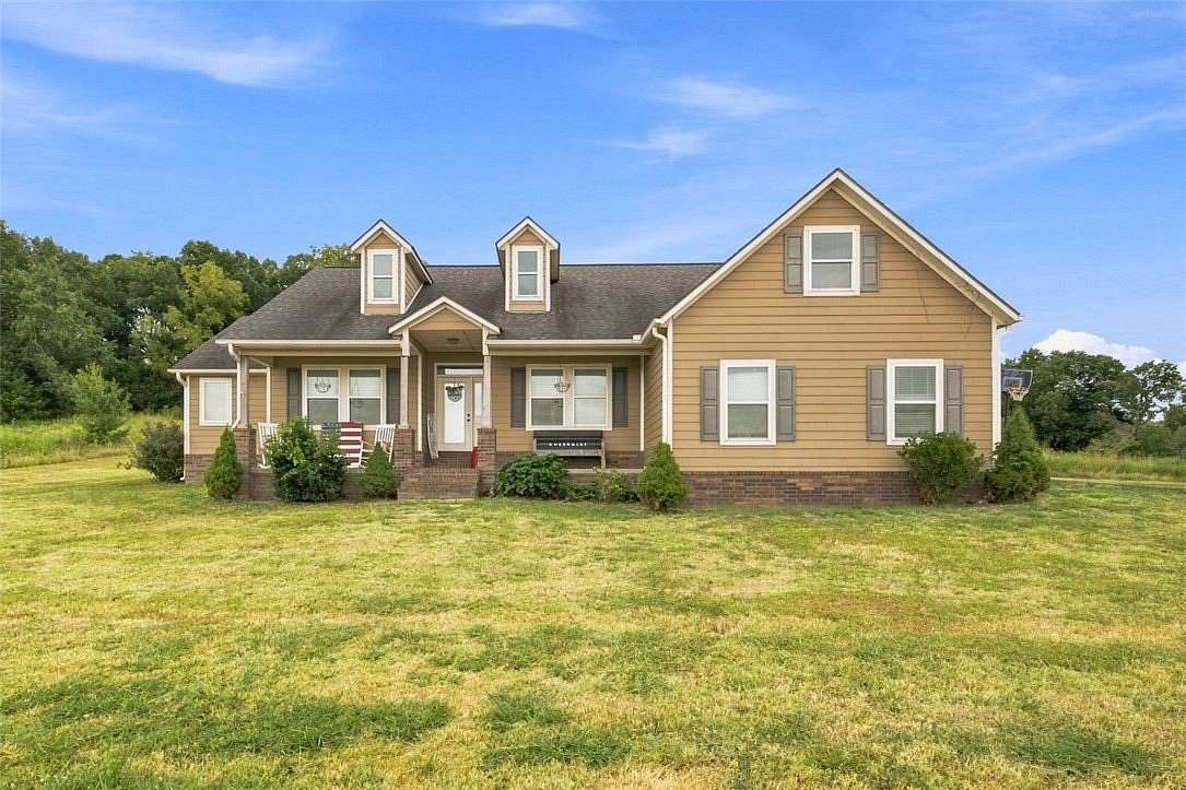7 Acres of Land with Home for Sale in Prairie Grove, Arkansas