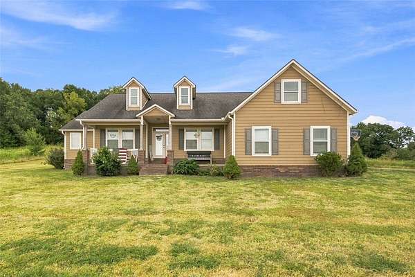 7 Acres of Land with Home for Sale in Prairie Grove, Arkansas
