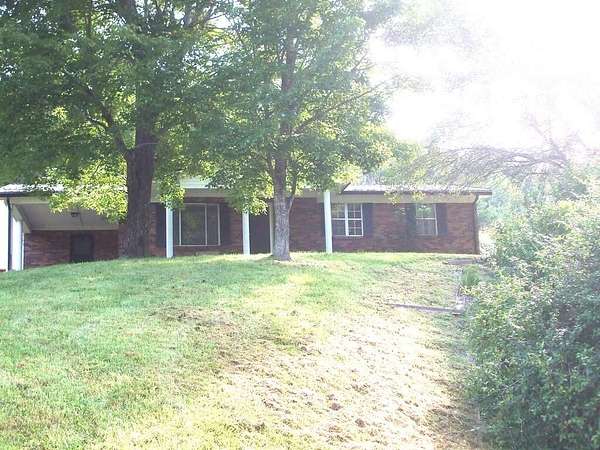 16.3 Acres of Land with Home for Sale in Salyersville, Kentucky