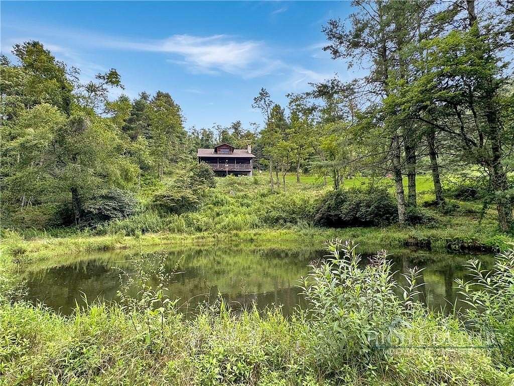 24 Acres of Land with Home for Sale in Laurel Springs, North Carolina