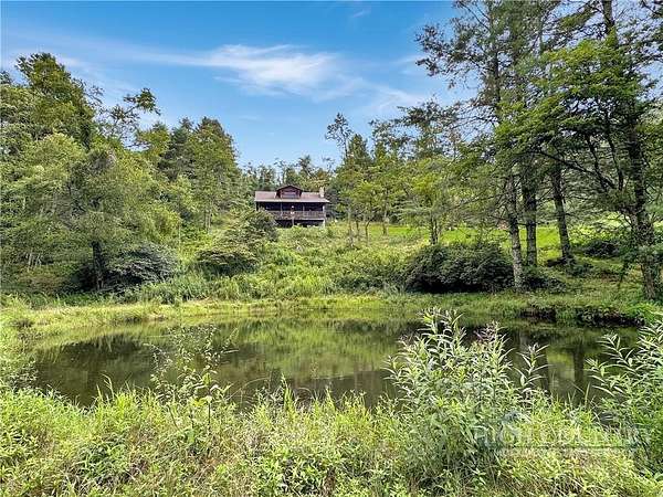 24 Acres of Land with Home for Sale in Laurel Springs, North Carolina