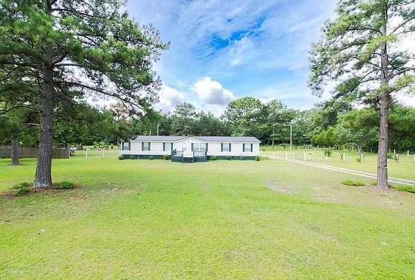 4 Acres of Land with Home for Sale in Fort Mitchell, Alabama