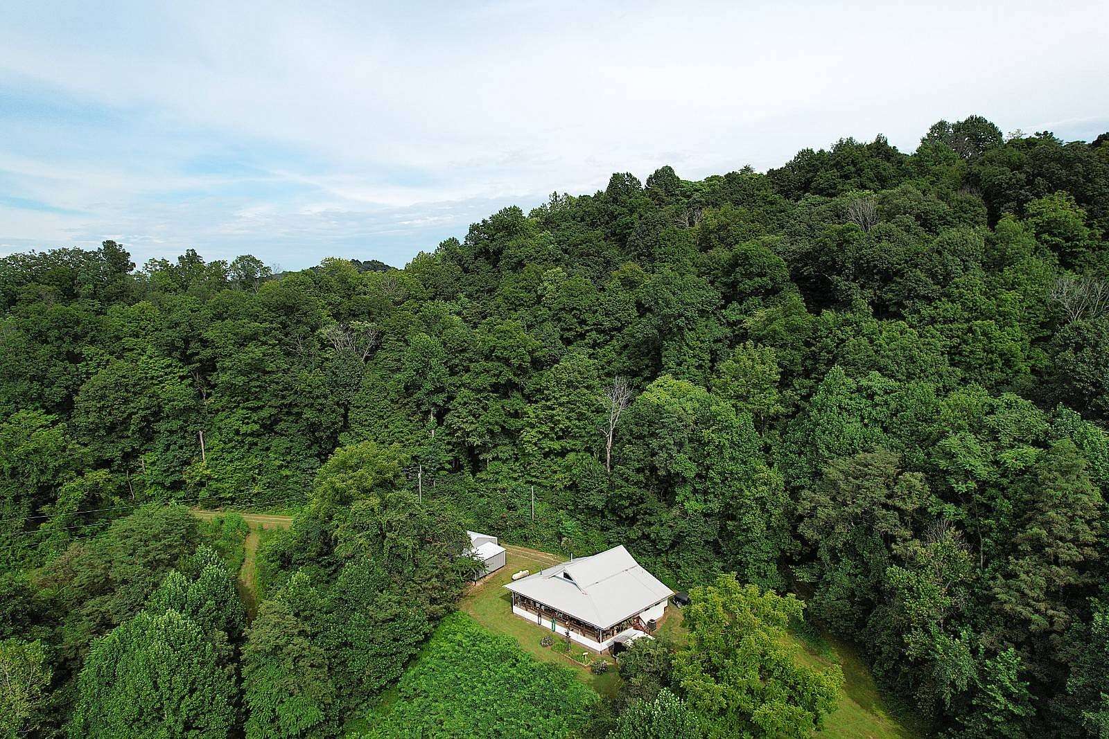 50 Acres of Recreational Land with Home for Sale in Liberty, Kentucky