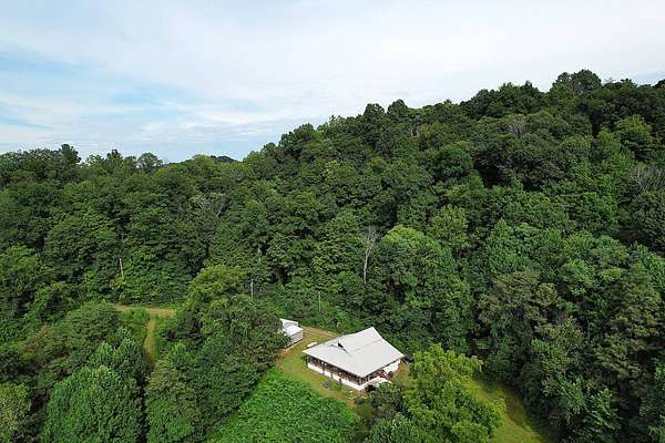50 Acres of Recreational Land with Home for Sale in Liberty, Kentucky
