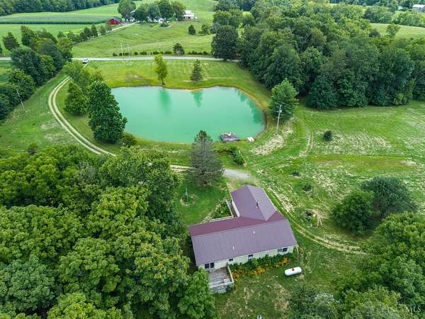 20.9 Acres of Recreational Land with Home for Auction in Jackson Township, Ohio