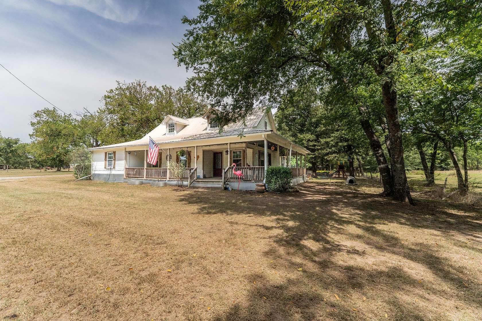 9.6 Acres of Land with Home for Sale in Brashear, Texas