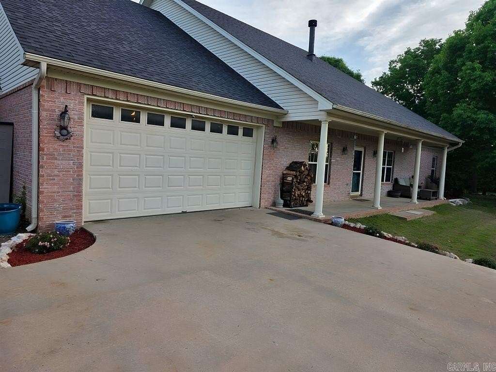 6 Acres of Land with Home for Sale in Alexander, Arkansas