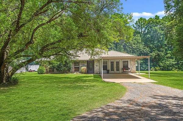 10.5 Acres of Recreational Land with Home for Sale in Hemphill, Texas